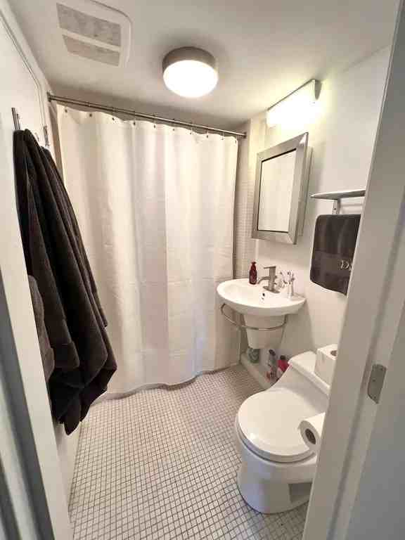 345 Harvard St #1F - Photo 7 of 10
