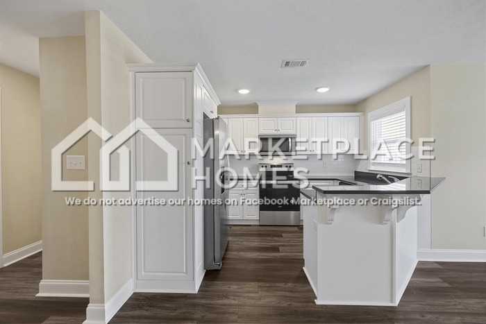 2219 Perrins Ln - Photo 6 of 30