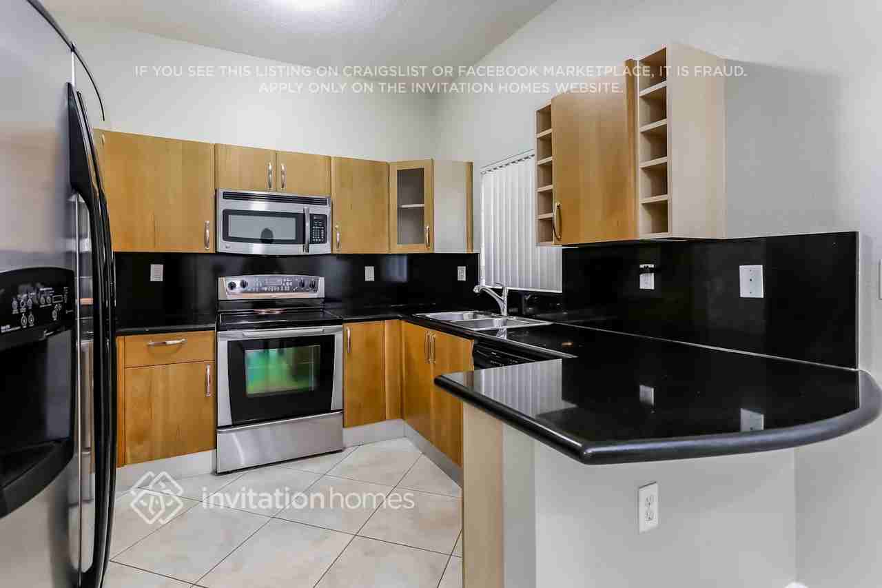 7449 Nw 181st St - Photo 4 of 19