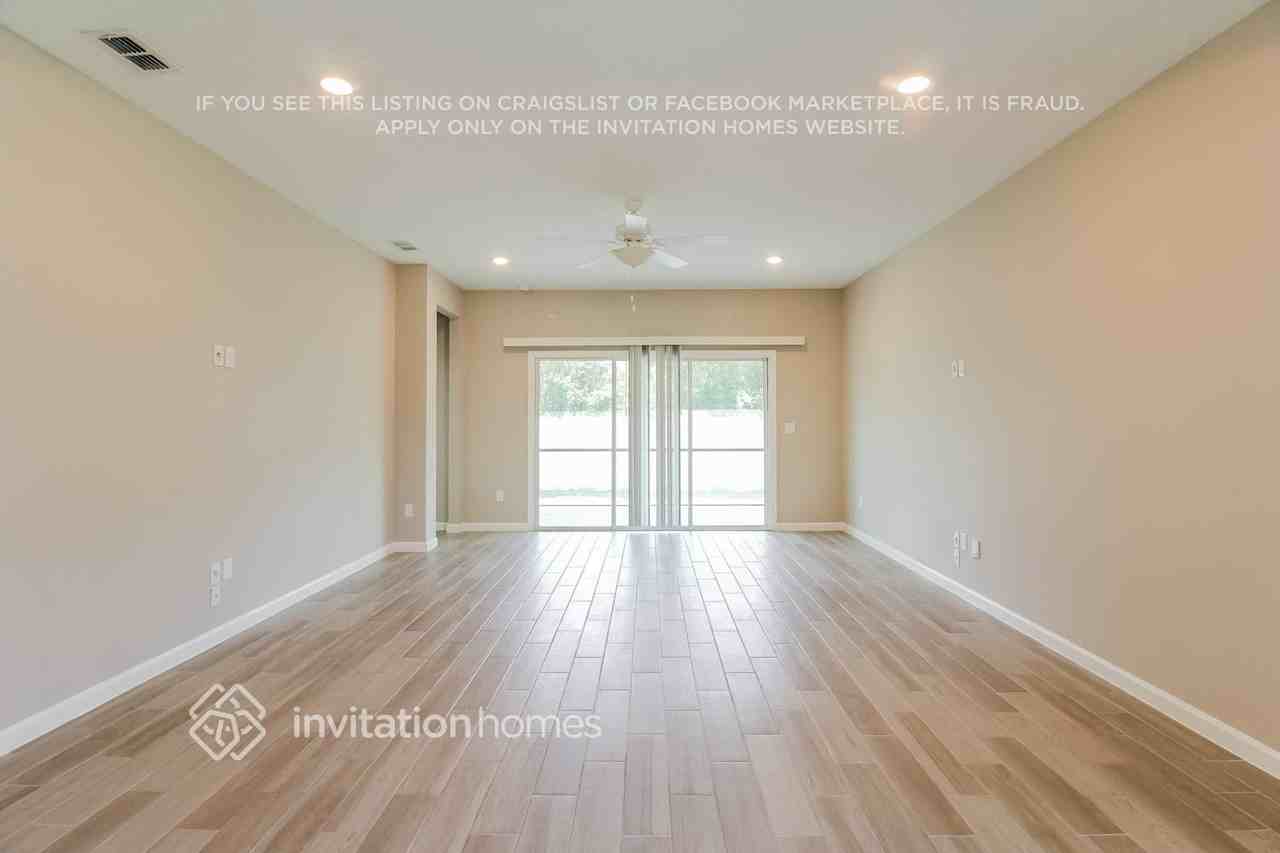 11376 Oyster Creek Rd - Photo 3 of 17