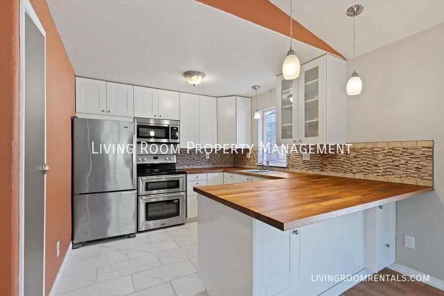 1318 Ne Rosa Parks Way - Photo 5 of 25