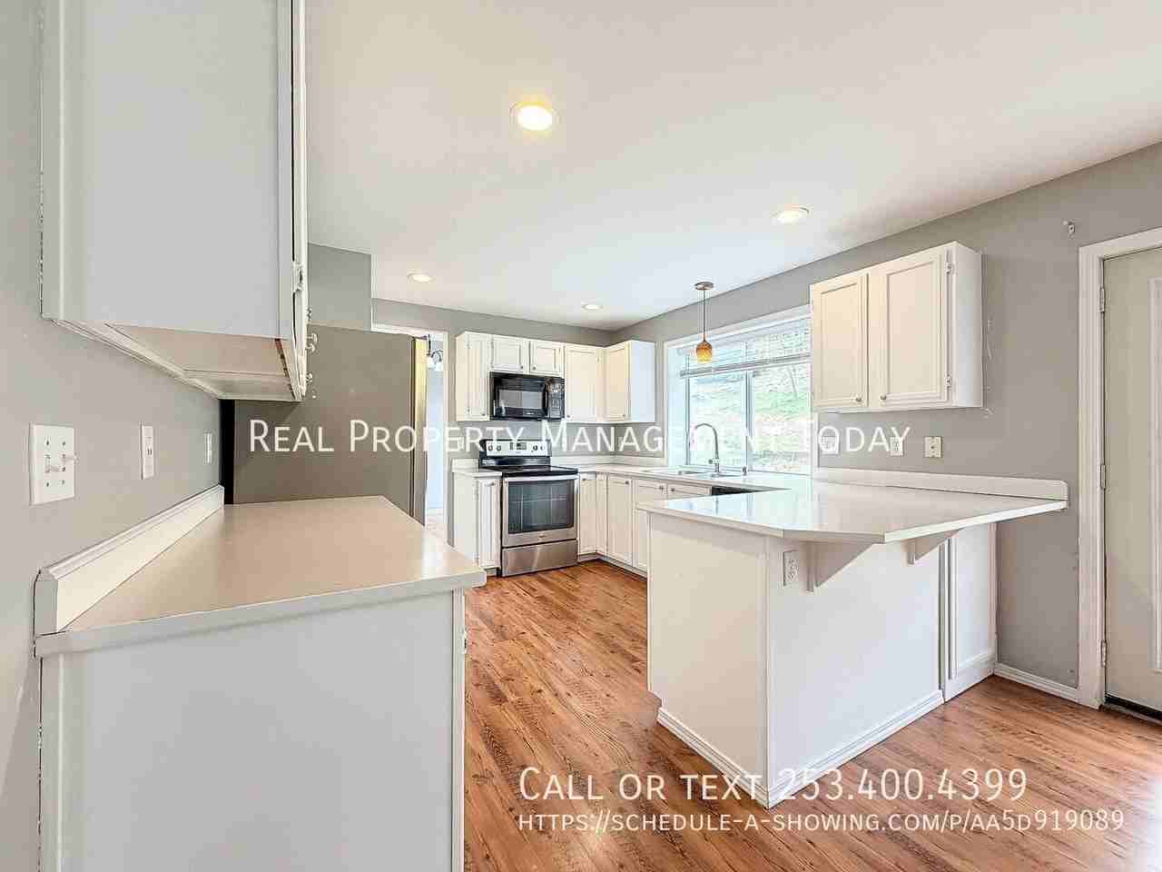 4914 Norpoint Way Ne - Photo 3 of 27