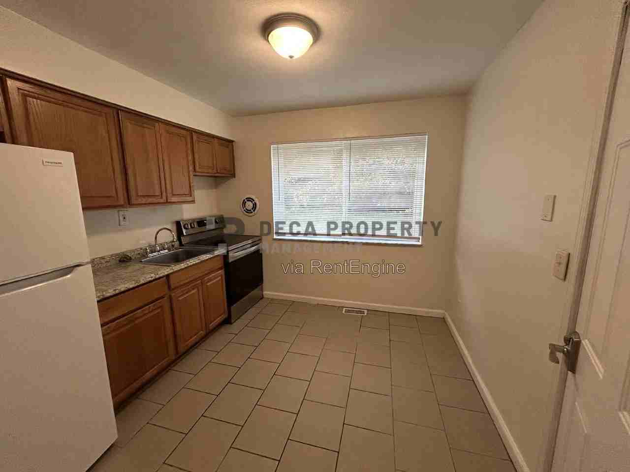 9910 Broadmoor Dr #1 - Photo 4 of 11