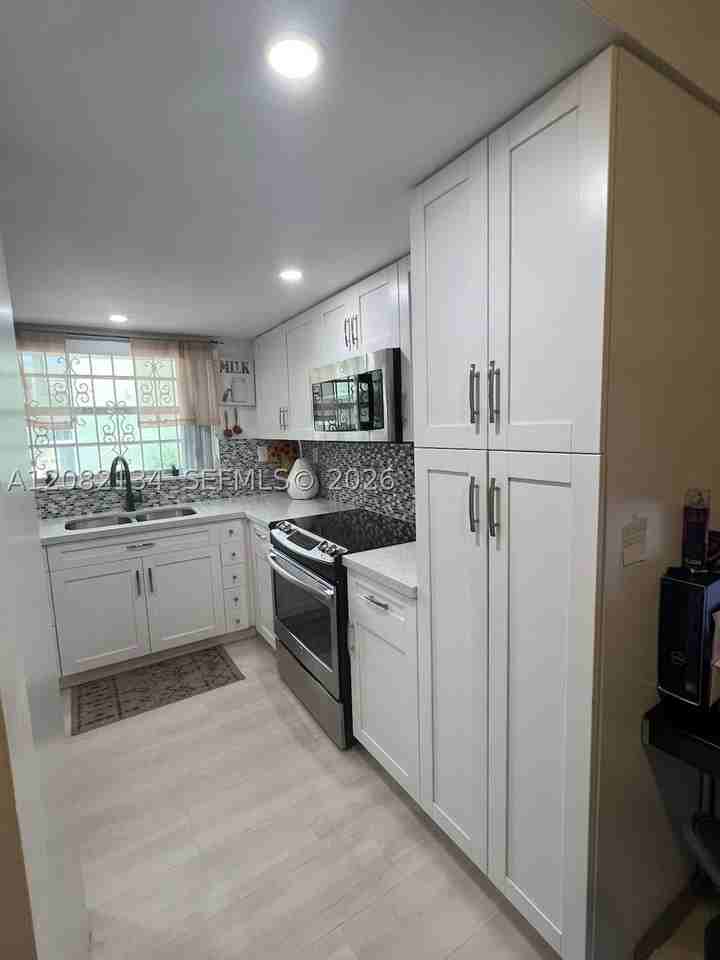 11183 Nw 7th St #104 - Photo 2 of 24
