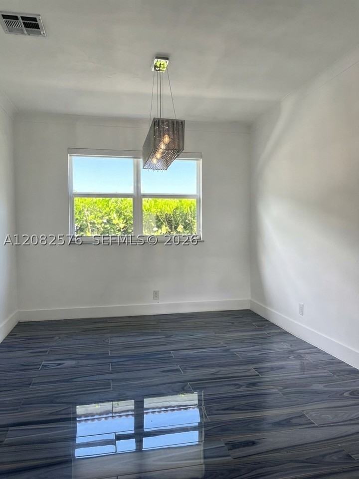 501 90th St #1 - Photo 4 of 16