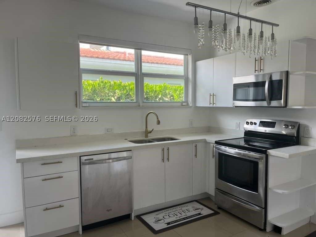 501 90th St #1 - Photo 5 of 16