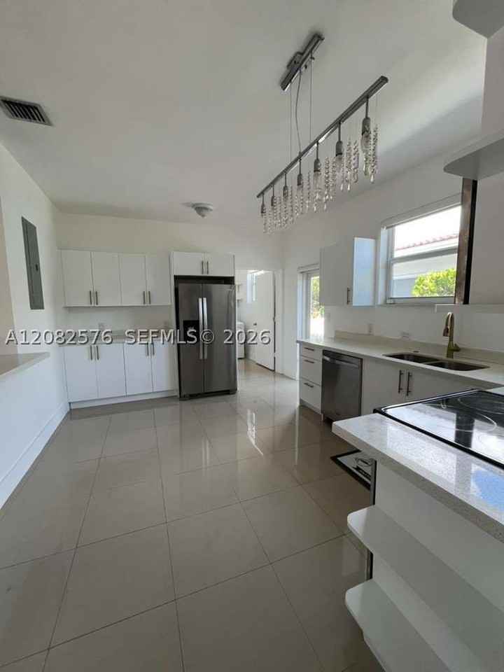 501 90th St #1 - Photo 6 of 16