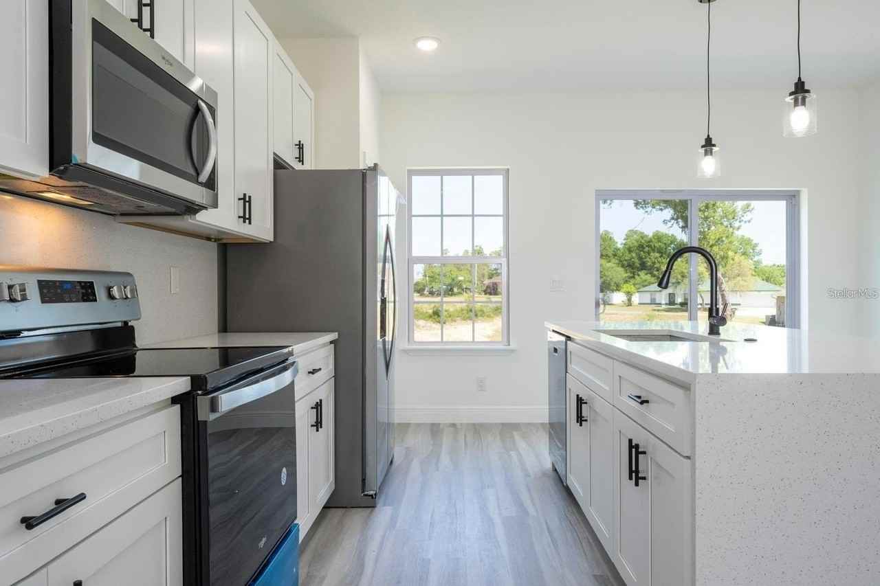 3211 Sw 128th Street Rd - Photo 2 of 32