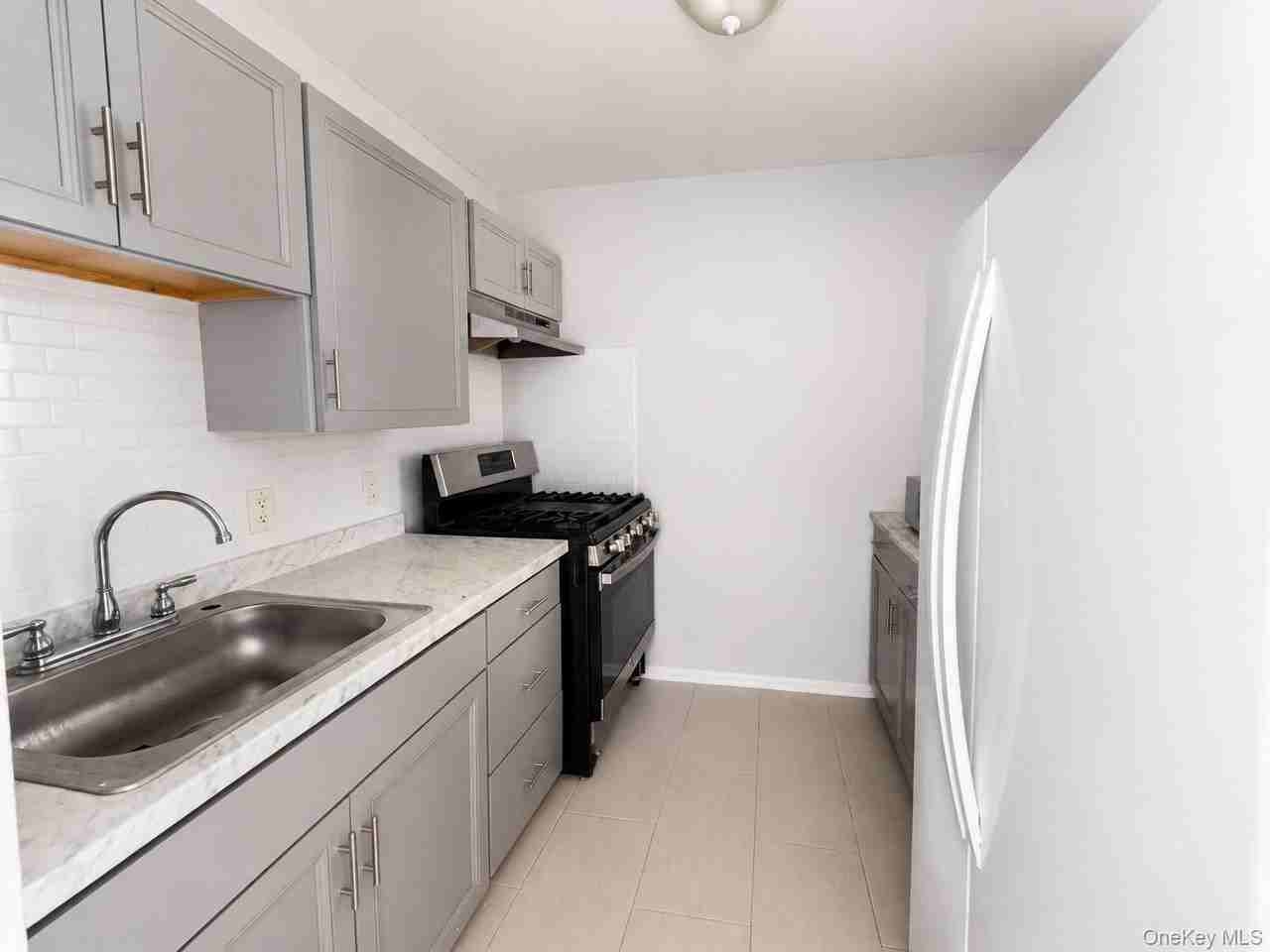 4216 Rockaway Beach Blvd #1stFL - Photo 4 of 10