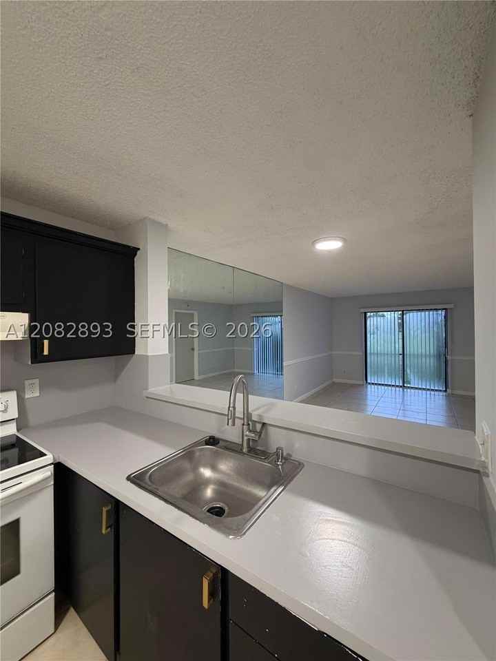 1170 Nw 80th Ave #104 - Photo 3 of 13