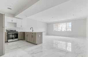 featured image of 129 Spring St - 127 Spring St. 208