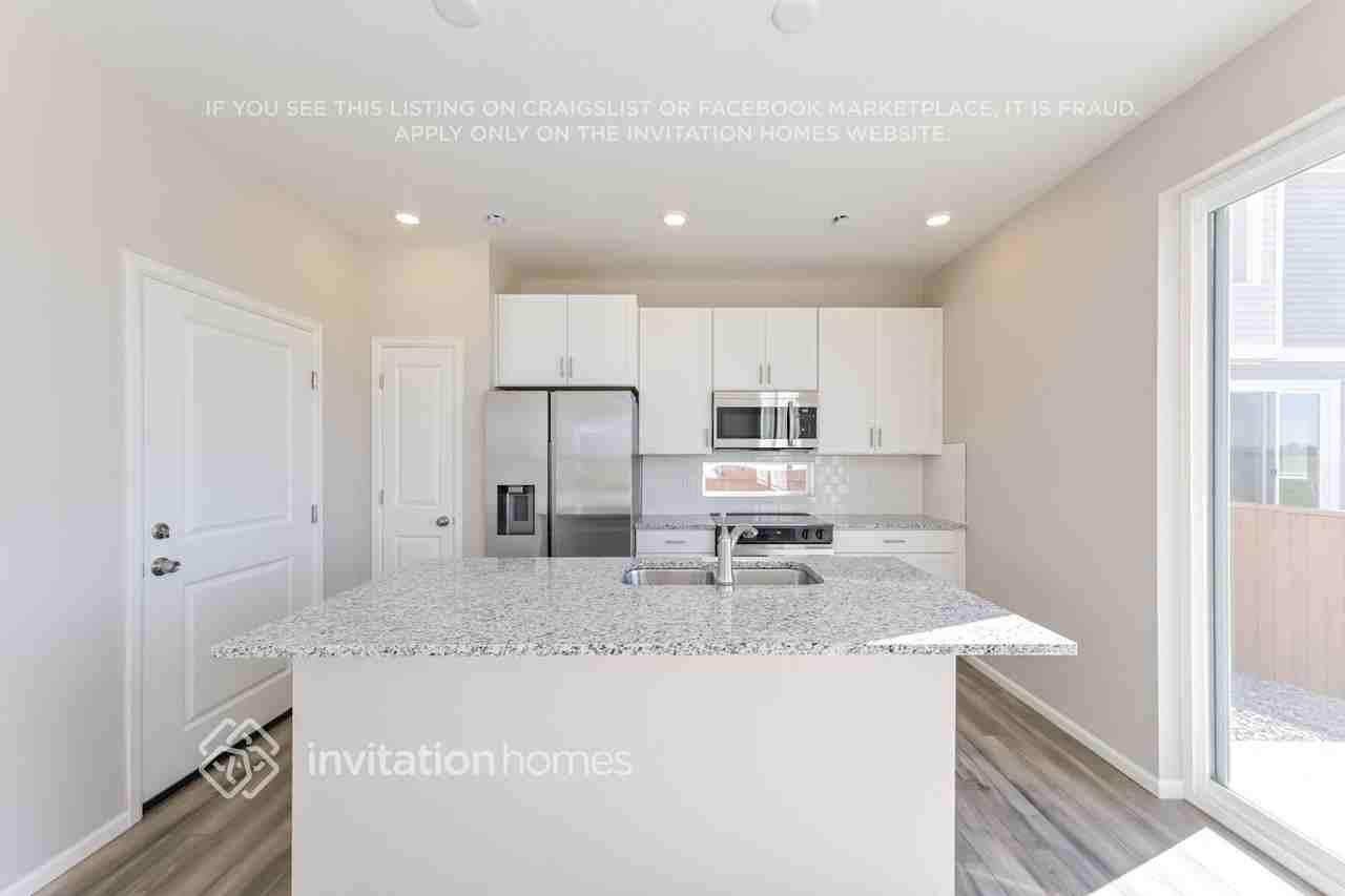 12610 E 100th Ave - Photo 7 of 18