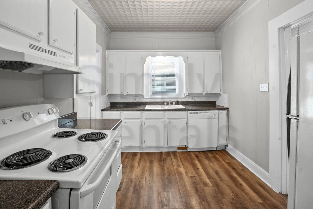 1410 Sycamore St - Photo 5 of 29