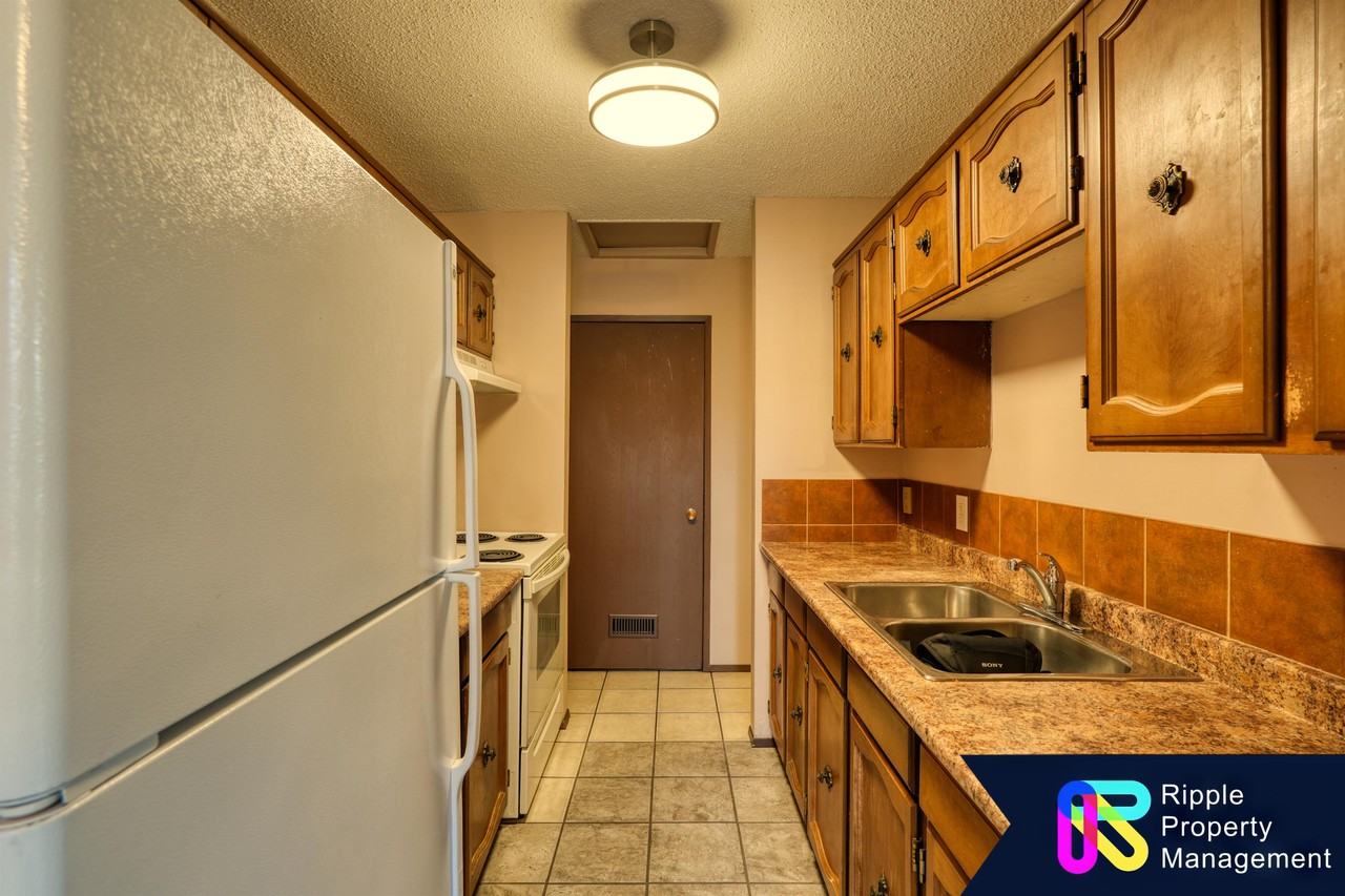 7712 Bowness Rd Nw Unit C - Photo 6 of 15