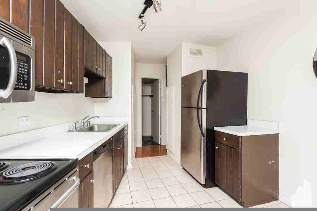 3930 North Pine Grove Avenue, Unit 901 - Photo 2 of 20