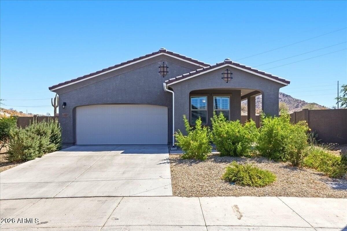11957 S 172nd Ave - Photo 6 of 42