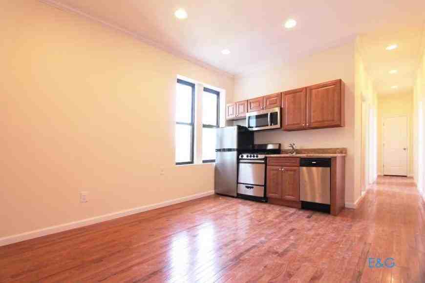 412 E 51st St - Photo 3 of 10