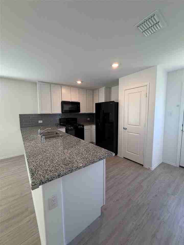 11719 Bone Spring Dr - Photo 7 of 16
