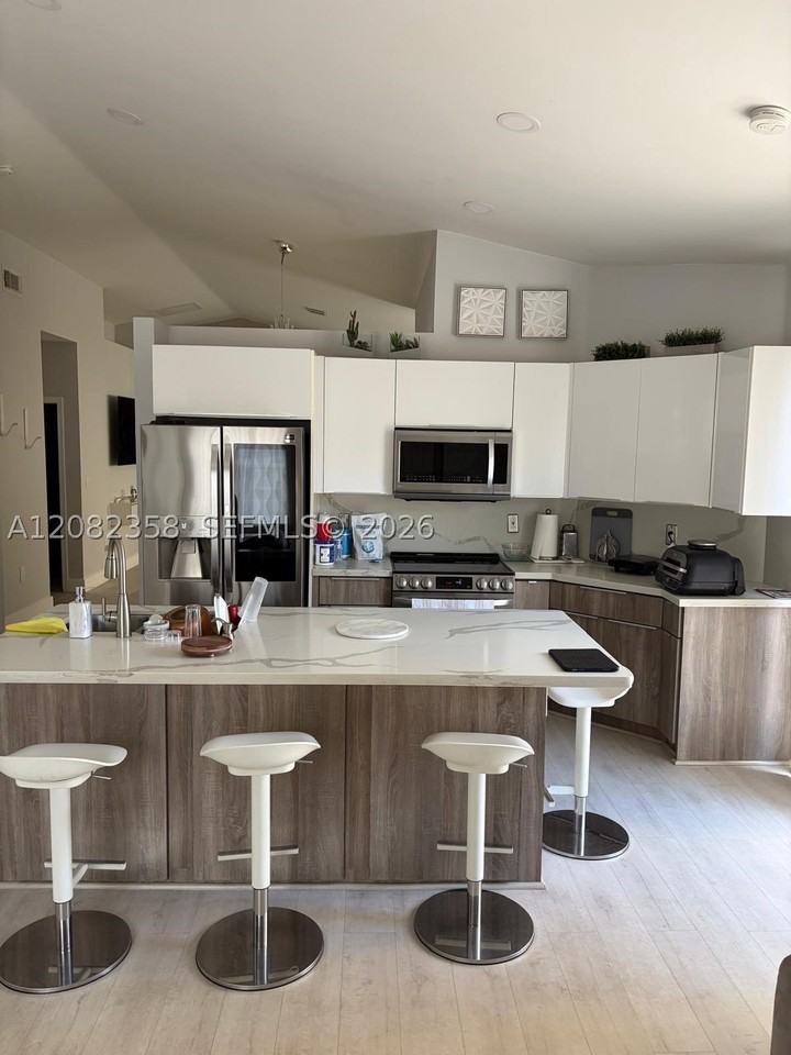 11263 Nw 51st Ter #0 - Photo 3 of 24