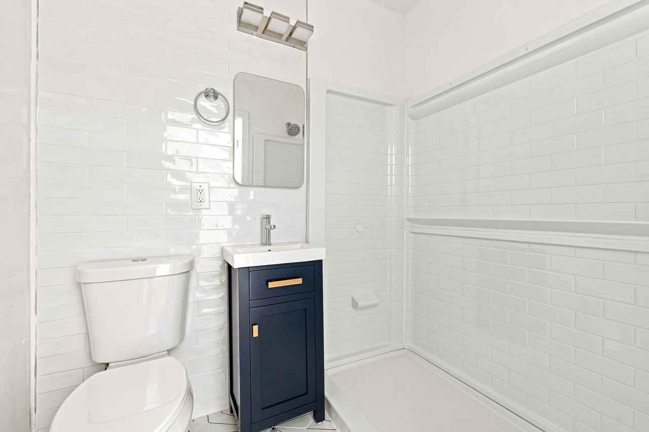 1030 E Chelten Ave - Photo 4 of 13