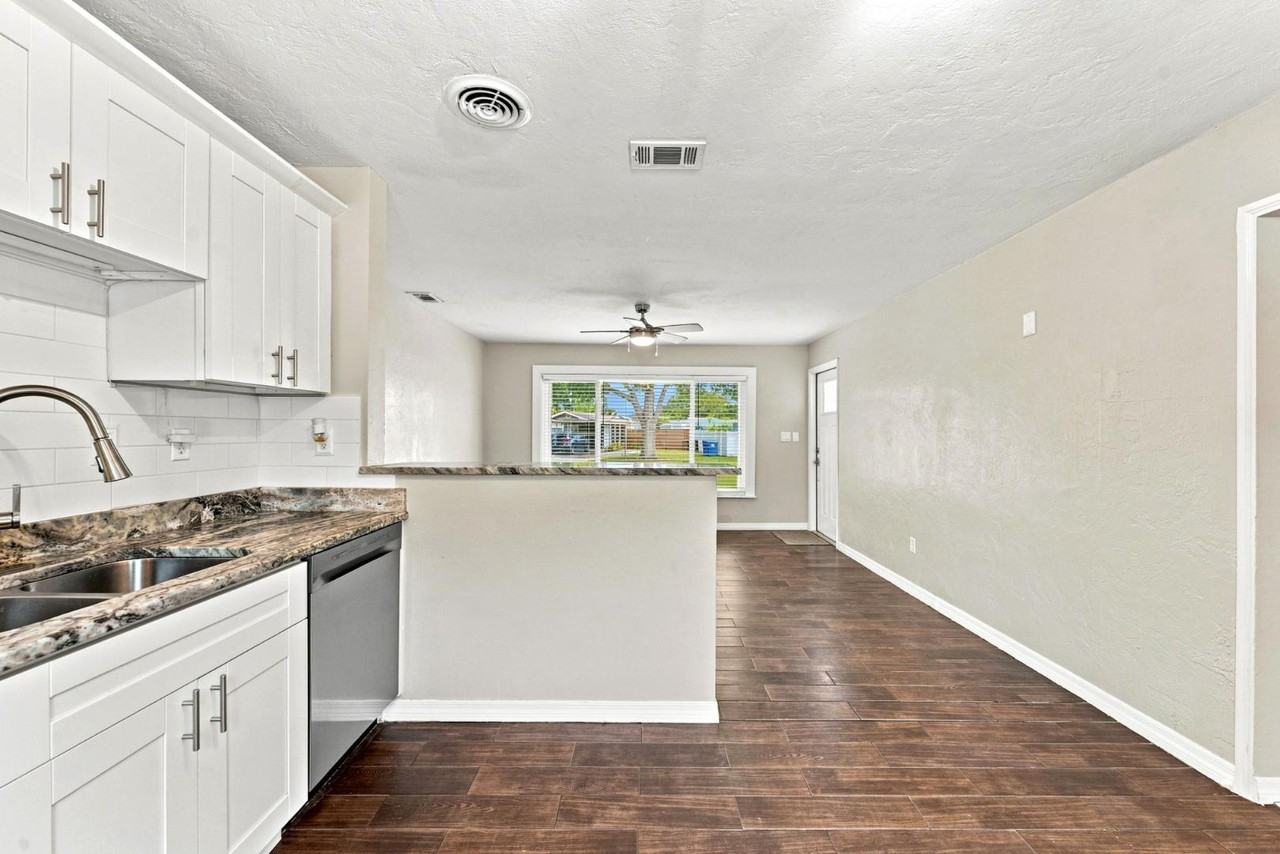 7235 Orpine Dr N - Photo 2 of 11
