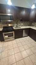 7554 S Essex Ave #54G - Photo 1 of 1