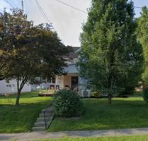 featured image of 829 1/2 W State St