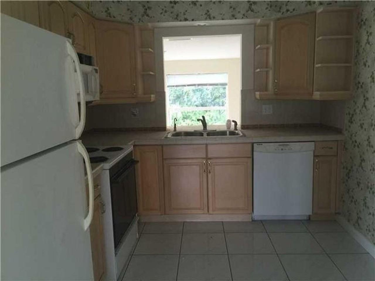 9330 Nw 42nd Ct - Photo 2 of 12
