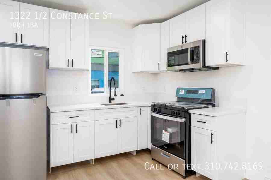 1322 1/2 Constance St - Photo 4 of 19