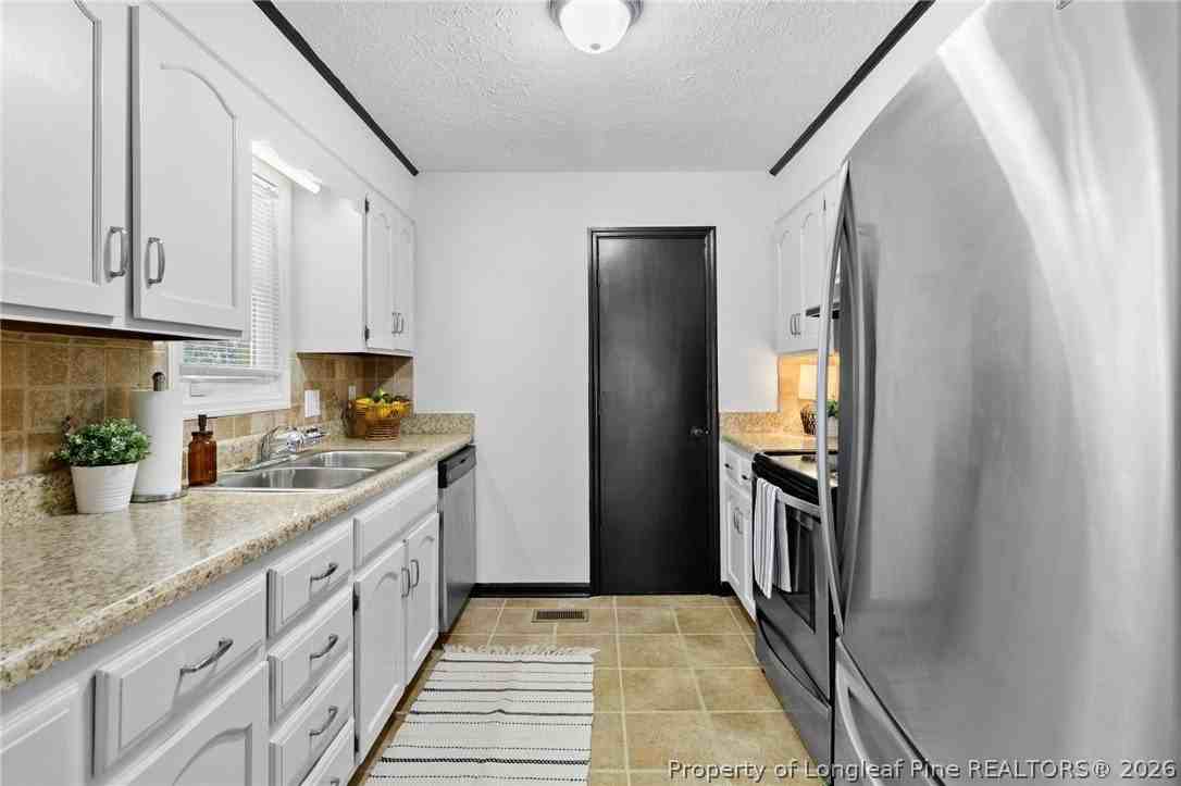 7016 Trevor Ln - Photo 5 of 17