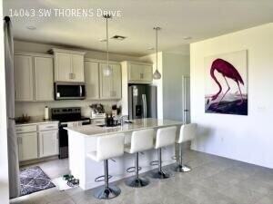 14043 Sw Thorens Dr - Photo 2 of 28