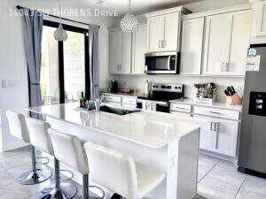 14043 Sw Thorens Dr - Photo 3 of 28