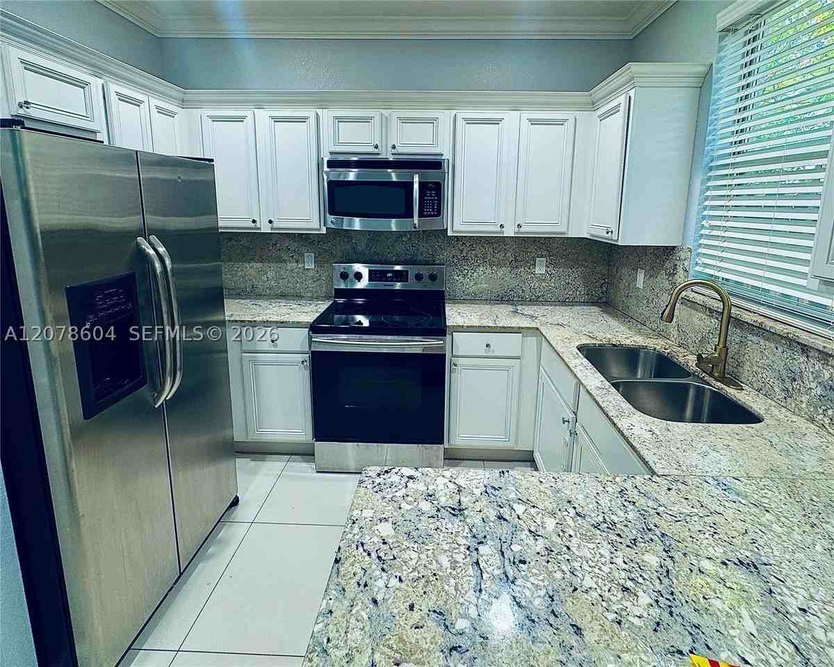 1035 Ne 207th Ter - Photo 2 of 18