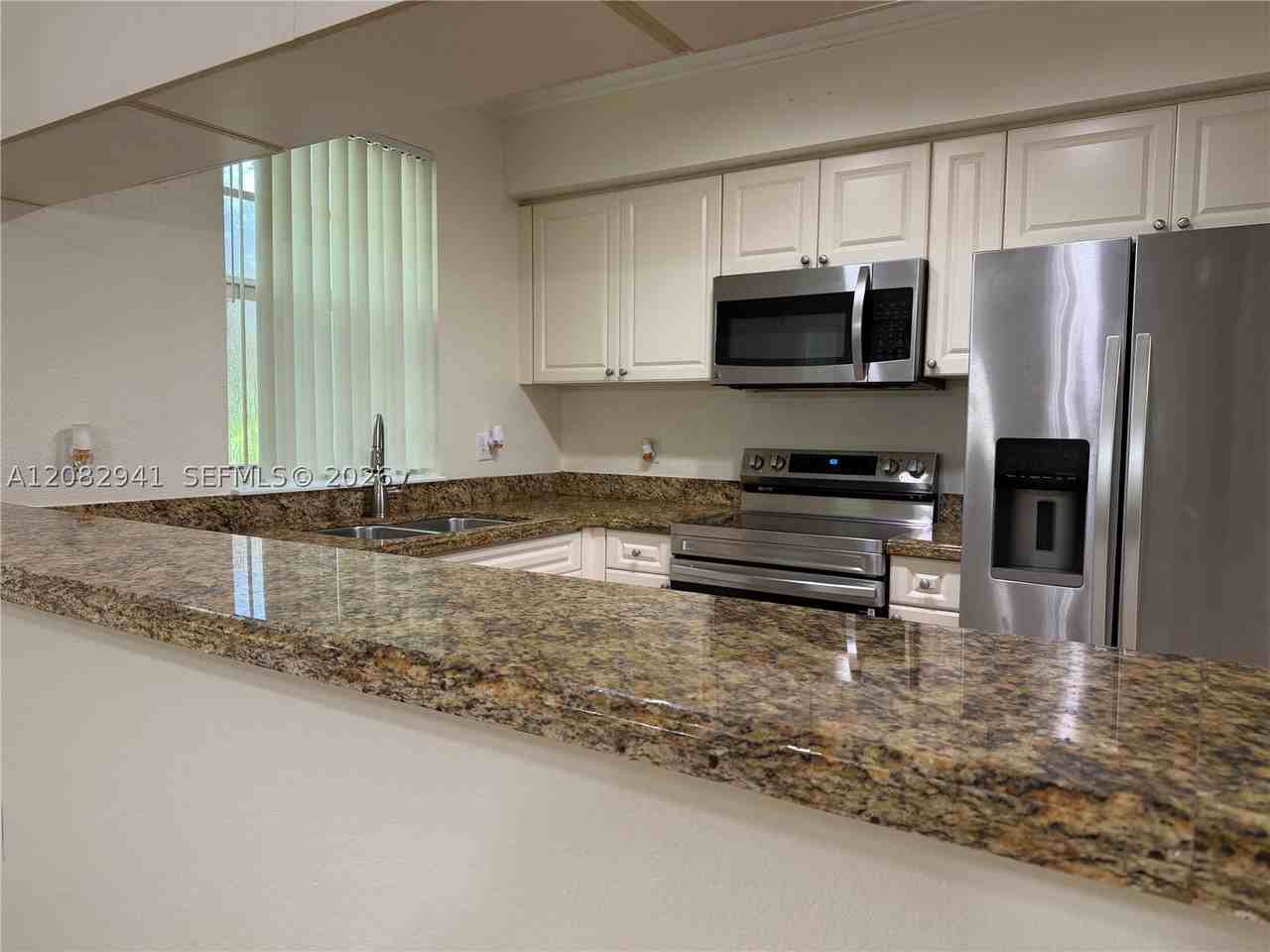 6956 W Sample Rd #6956 - Photo 4 of 37