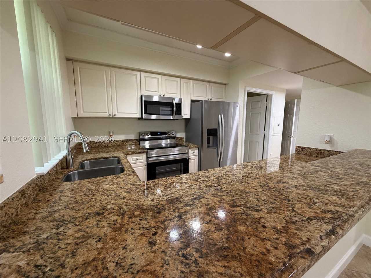 6956 W Sample Rd #6956 - Photo 5 of 37