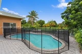 10989 Nw 56th Ct - Photo 3 of 9