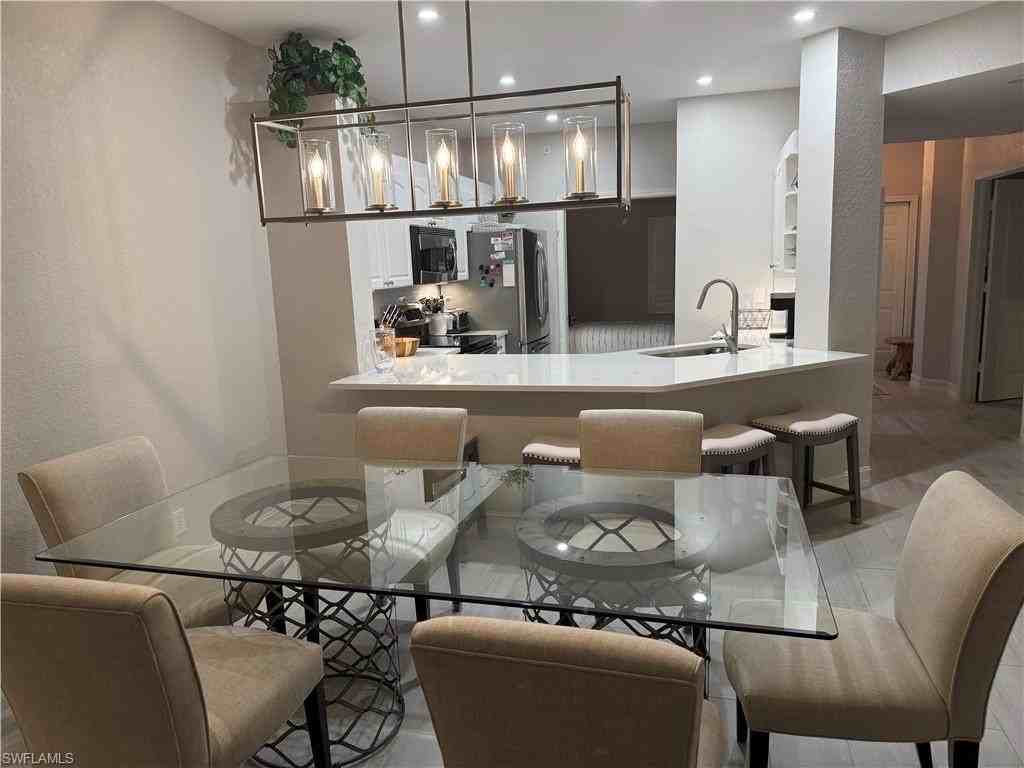 7725 Pebble Creek Cir #103 - Photo 3 of 24
