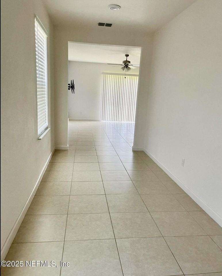 8709 Lake George Cir E - Photo 2 of 16