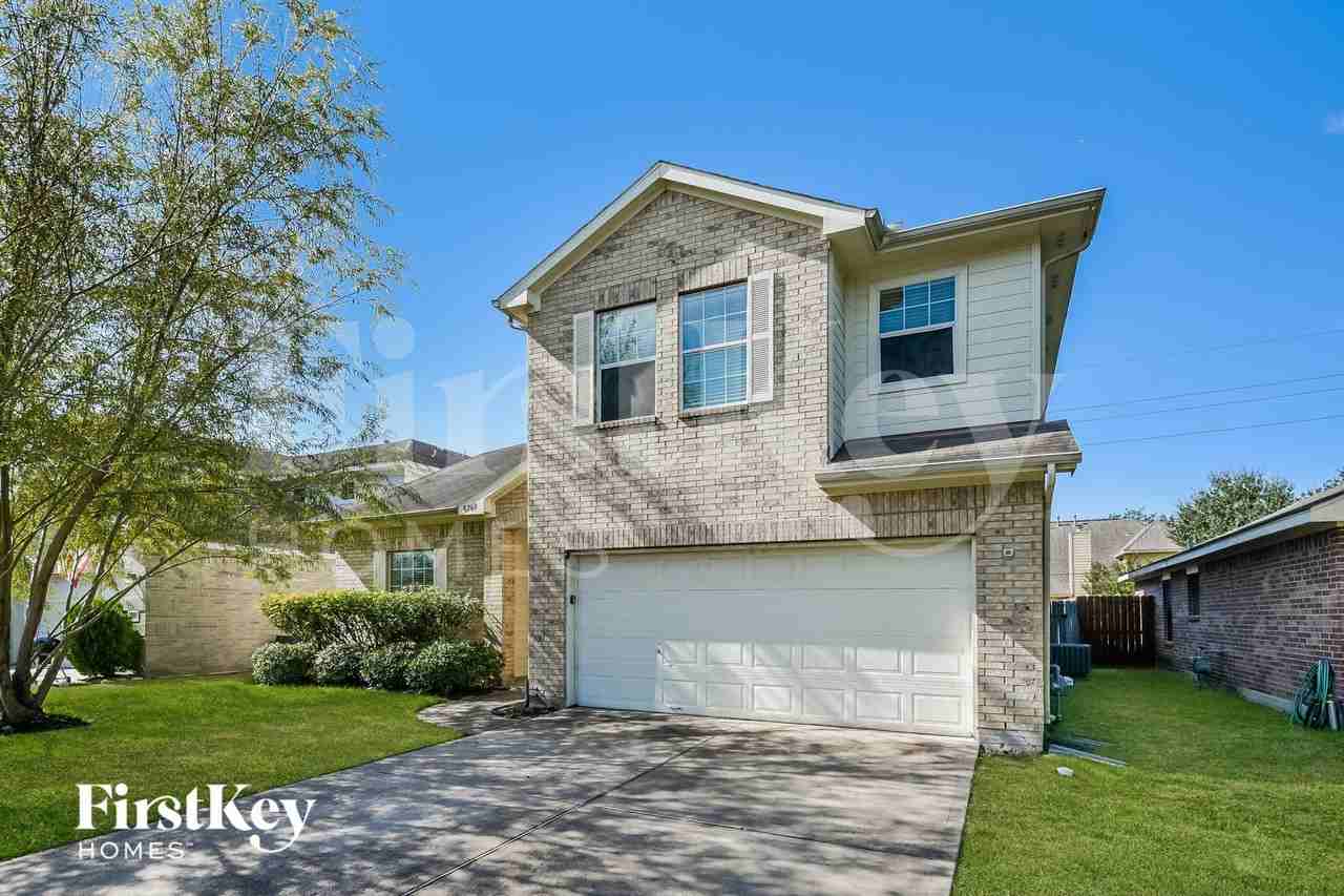 8207 Sugar Cane Dr - Photo 2 of 15