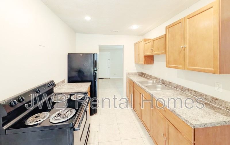 6835 Tinkerbell Ln - Photo 2 of 17