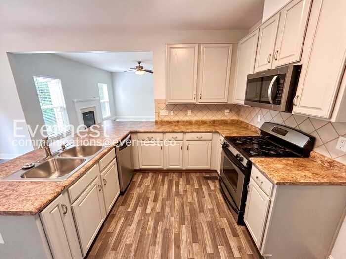 1287 Wheatley Forest Dr - Photo 7 of 39