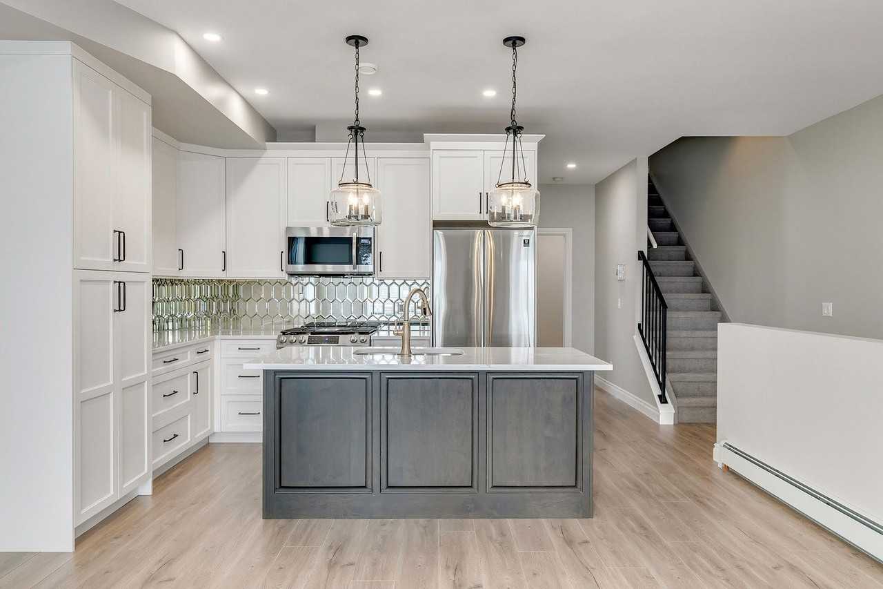 232 - 232 20 Ave Nw - Photo 5 of 16