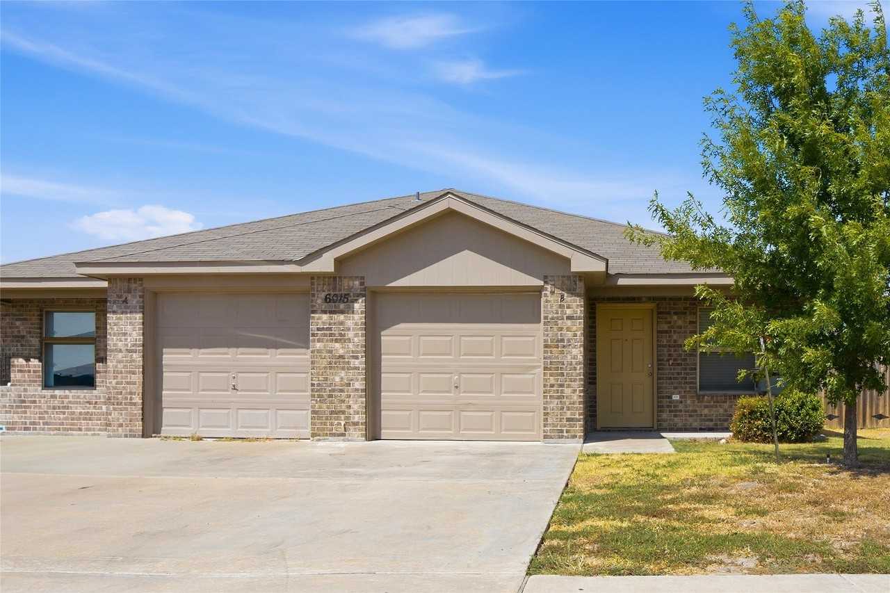 6015 Amelia Earhart Blvd #B - Photo 2 of 17