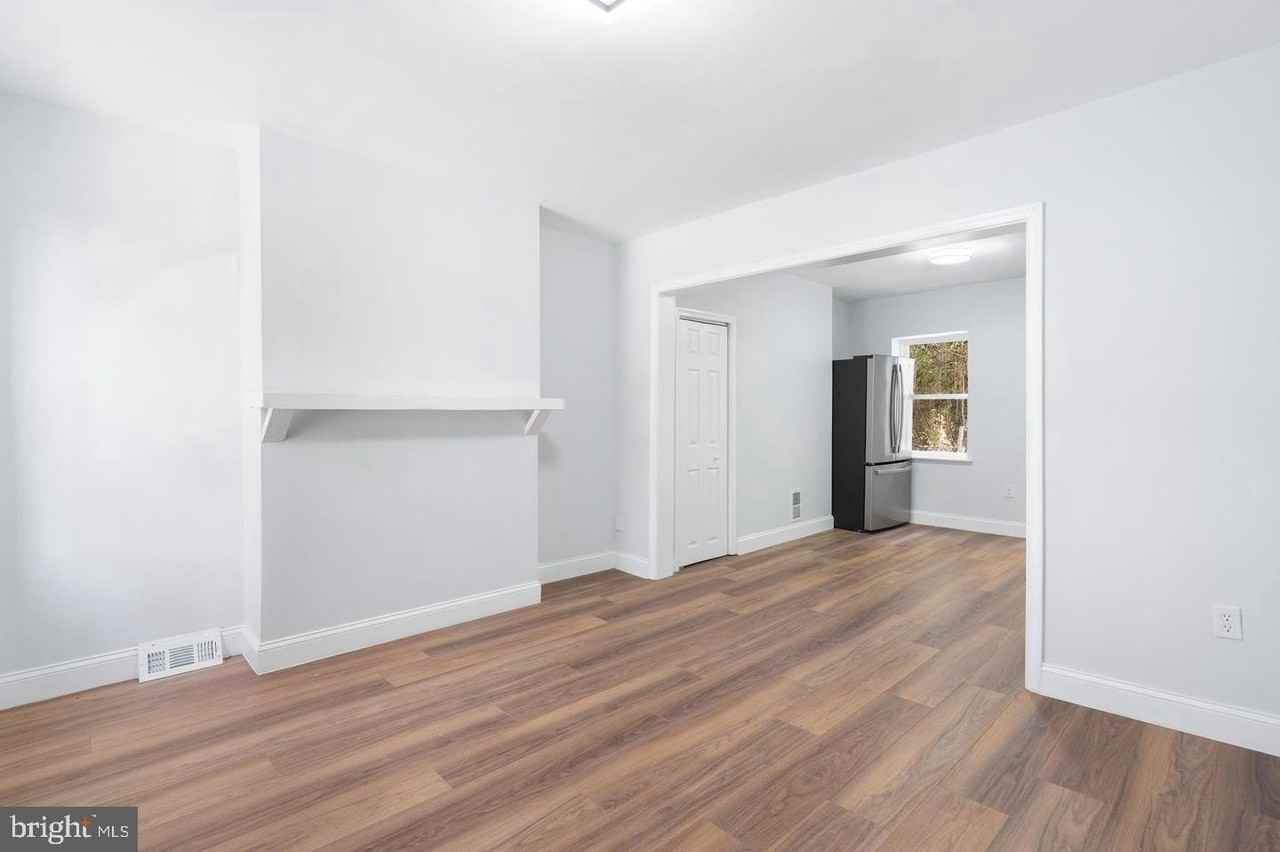 105 N Carrollton Ave - Photo 3 of 31