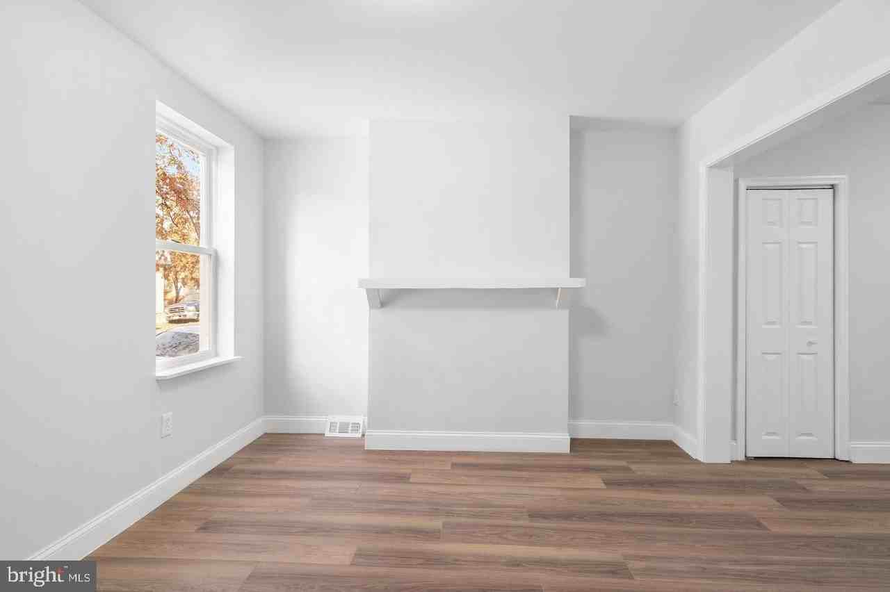 105 N Carrollton Ave - Photo 4 of 31