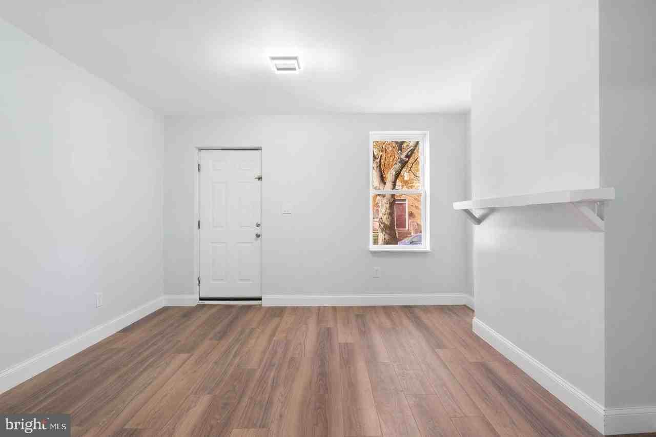 105 N Carrollton Ave - Photo 5 of 31