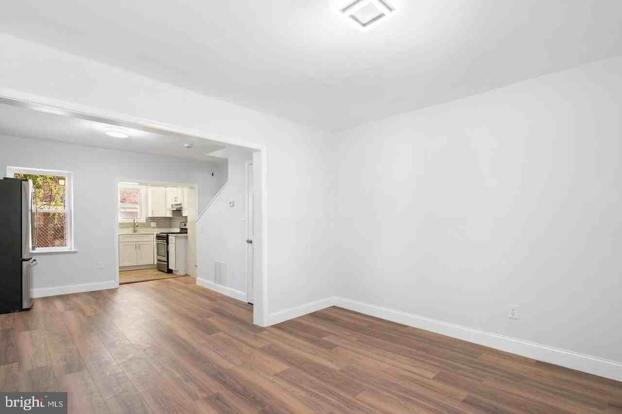 105 N Carrollton Ave - Photo 6 of 31