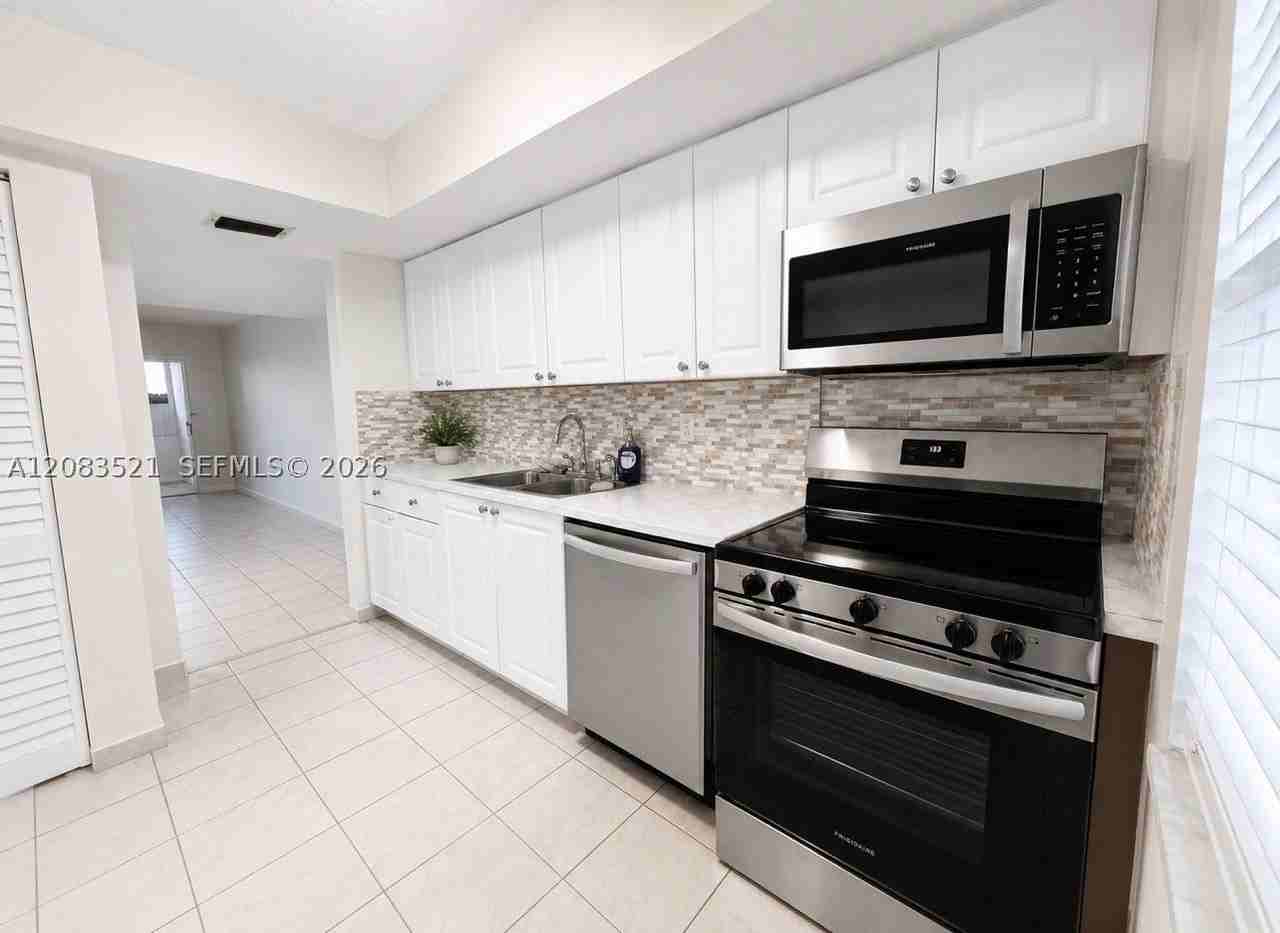 14115 Sw 66th St #I3 - Photo 3 of 5
