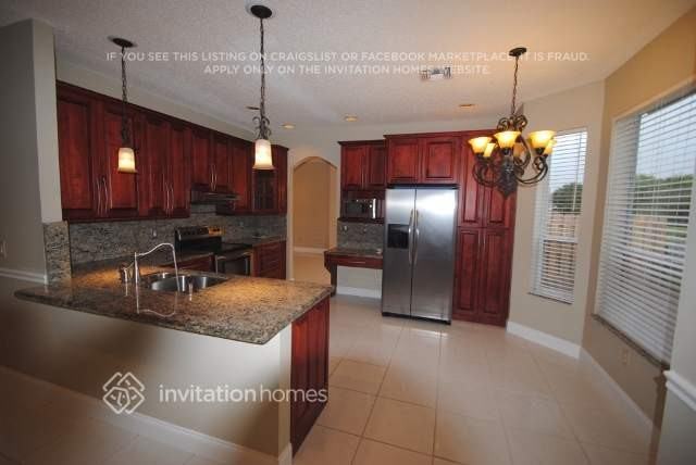 9684 Tavernier Dr - Photo 3 of 7