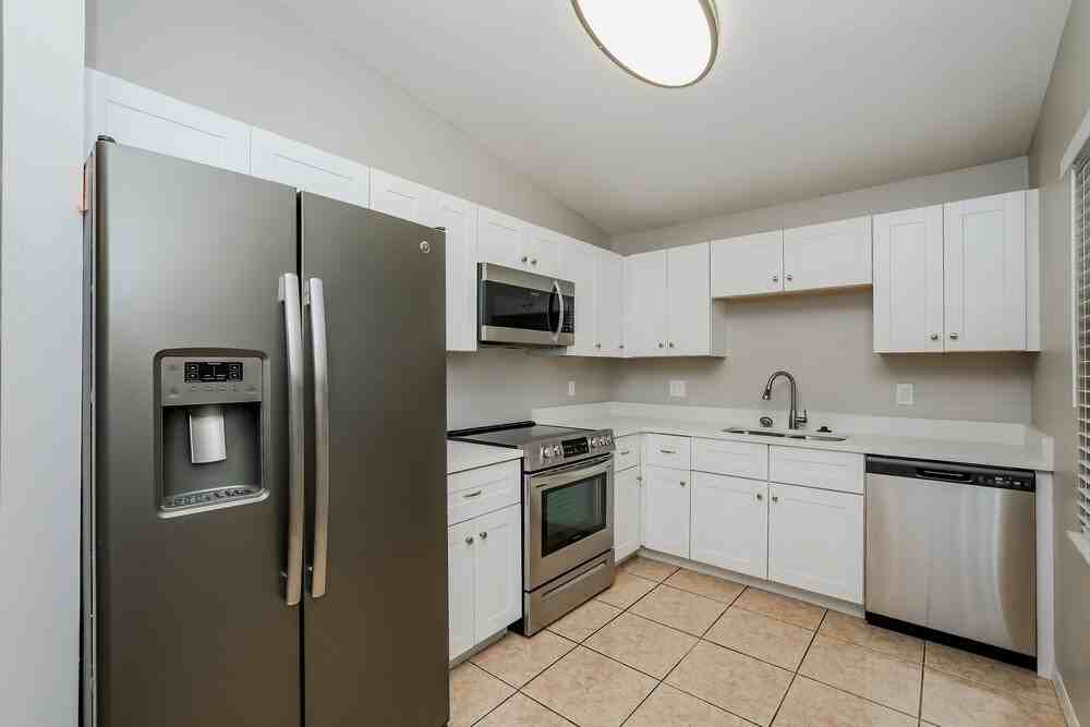 1402 Thistledown Dr - Photo 6 of 15